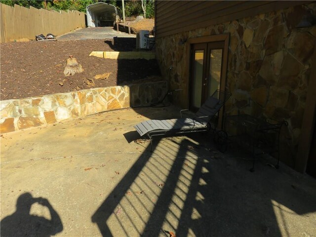 view of patio with fence and french doors