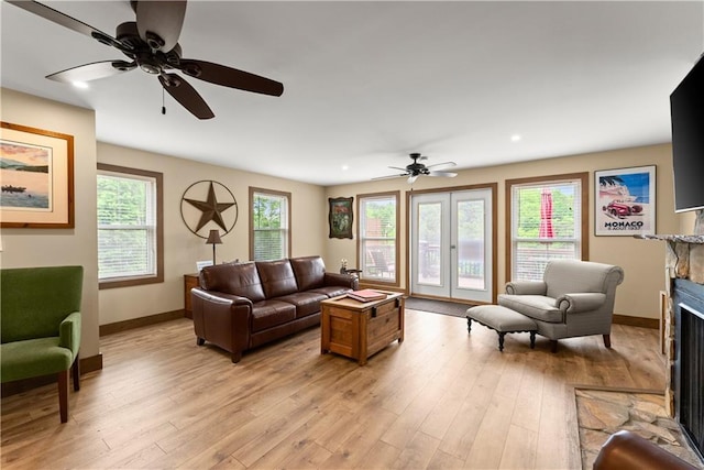 2109 Pine Tree Cir, Gainesville, GA 30501 - living room with a fireplace, baseboards, light wood-style flooring, ceiling fan, and recessed lighting
