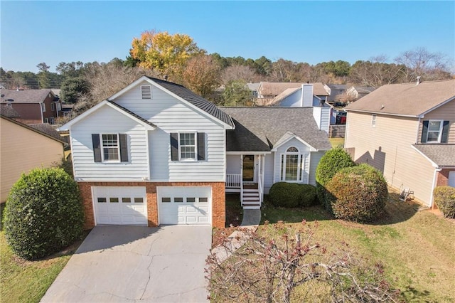 view of front facade featuring a garage and a front lawn