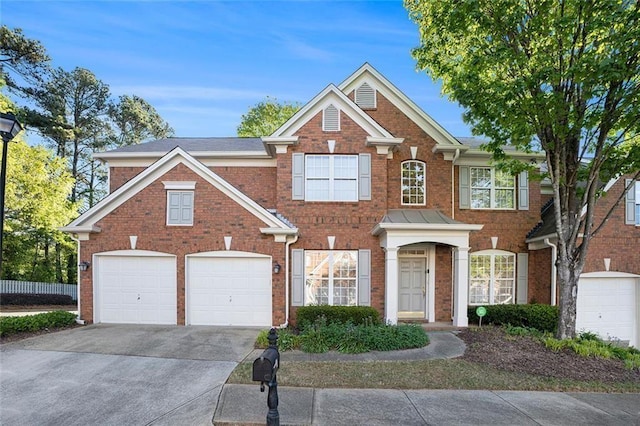 401 Wellwood Way, Roswell, GA 30075 - colonial-style house featuring driveway, brick siding, and a garage
