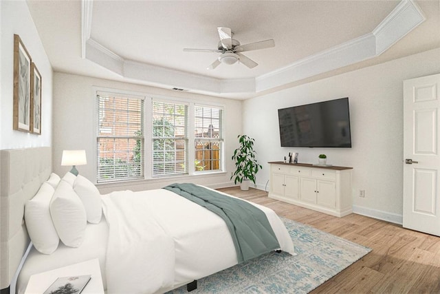 401 Wellwood Way, Roswell, GA 30075 - bedroom featuring a raised ceiling, ornamental molding, light wood-style flooring, and ceiling fan