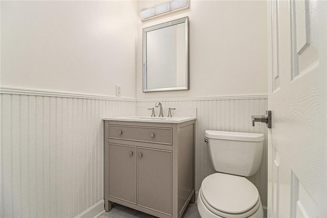 401 Wellwood Way, Roswell, GA 30075 - bathroom featuring a wainscoted wall and vanity