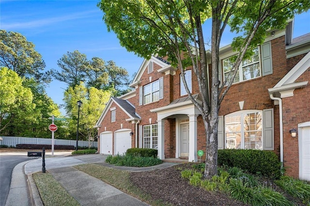 401 Wellwood Way, Roswell, GA 30075 - view of front of house featuring brick siding and concrete driveway