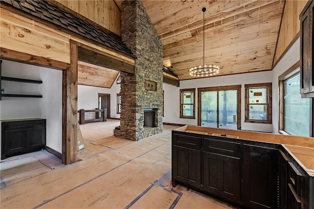 LOT40 Staurolite Mtn, Blue Ridge, GA 30513 - kitchen with a fireplace, wood ceiling, dark cabinetry, high vaulted ceiling, and a chandelier