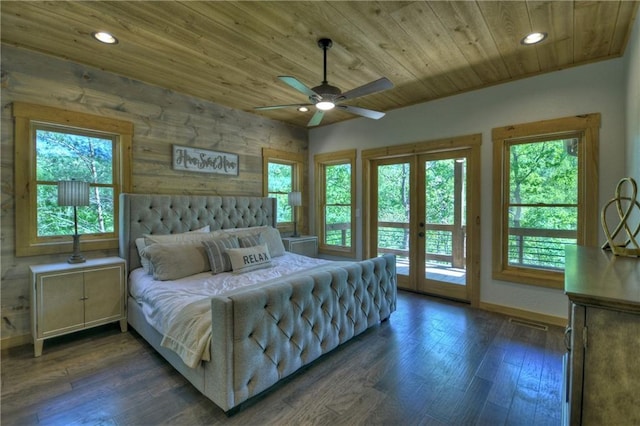 bedroom with multiple windows, access to outside, wooden ceiling, and french doors