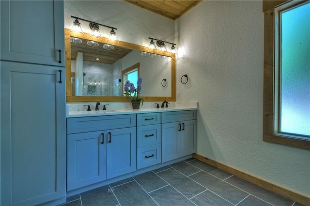 bathroom featuring tile patterned floors and vanity