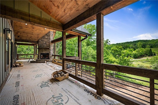 LOT40 Staurolite Mtn, Blue Ridge, GA 30513 - view of patio featuring an outdoor stone fireplace and a forest view