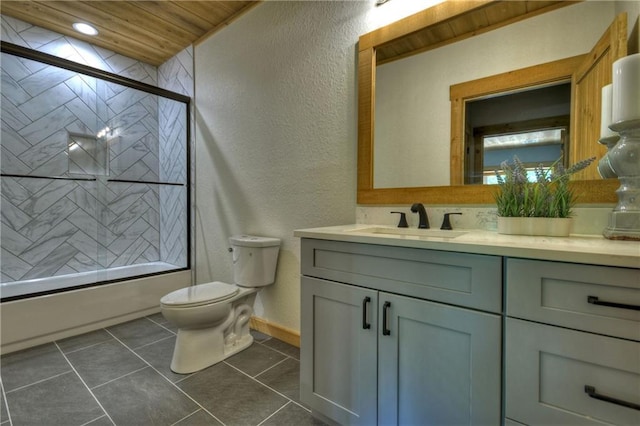 full bathroom featuring toilet, wooden ceiling, vanity, enclosed tub / shower combo, and tile patterned flooring