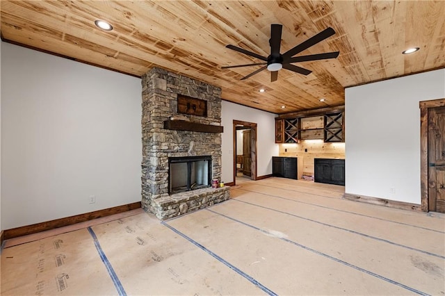 LOT40 Staurolite Mtn, Blue Ridge, GA 30513 - unfurnished living room featuring a stone fireplace, wooden ceiling, ceiling fan, baseboards, and recessed lighting