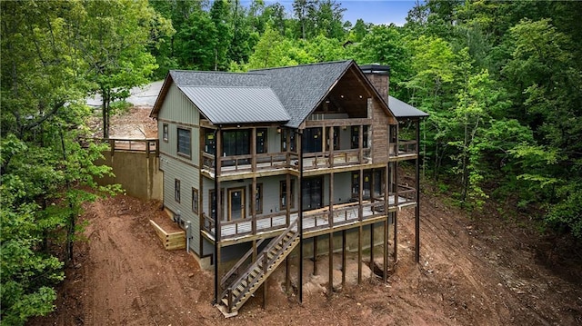 LOT40 Staurolite Mtn, Blue Ridge, GA 30513 - rear view of property featuring a deck, a chimney, roof with shingles, stairway, and a wooded view