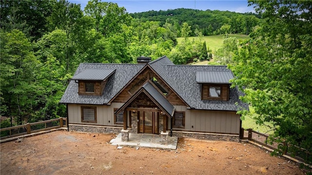 LOT40 Staurolite Mtn, Blue Ridge, GA 30513 - rustic home with a fenced backyard, a chimney, and a wooded view