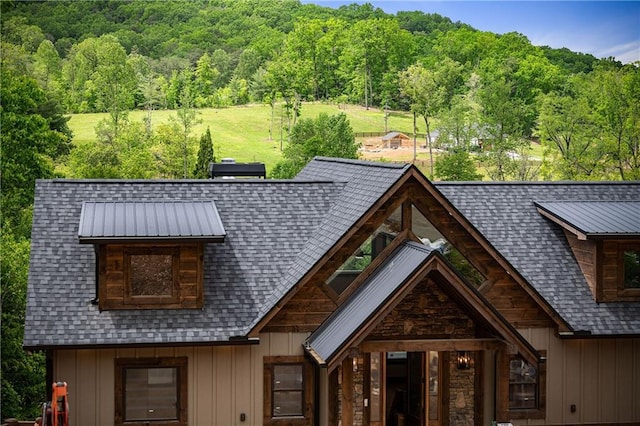 LOT40 Staurolite Mtn, Blue Ridge, GA 30513 - view of front of home featuring board and batten siding, a forest view, roof with shingles, and a front yard