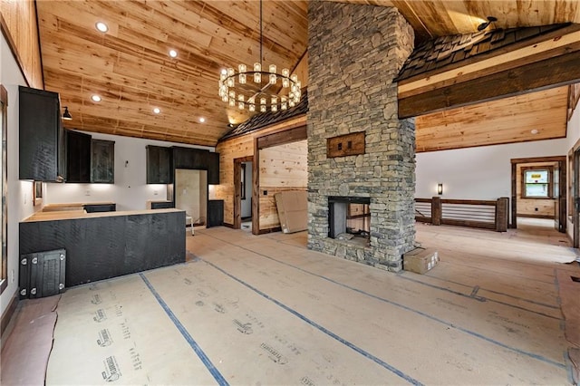 LOT40 Staurolite Mtn, Blue Ridge, GA 30513 - unfurnished living room with high vaulted ceiling, wood ceiling, a chandelier, an outdoor stone fireplace, and recessed lighting