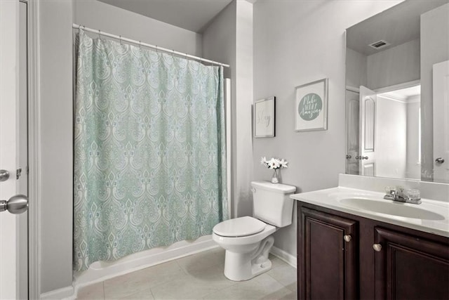 full bathroom featuring vanity, shower / bathtub combination with curtain, tile patterned floors, and toilet