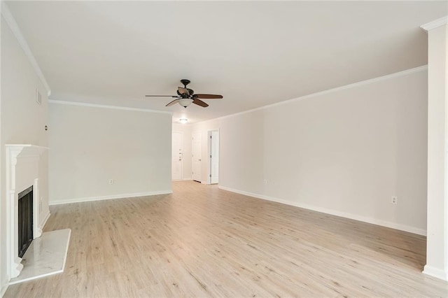 unfurnished living room featuring ornamental molding, light hardwood / wood-style floors, and ceiling fan