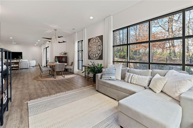 1494 Red Fox Dr NE Unit D, Atlanta, GA 30306 - living room featuring wood finished floors, plenty of natural light, ceiling fan, and recessed lighting