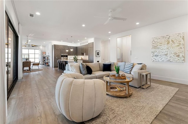 1494 Red Fox Dr NE Unit D, Atlanta, GA 30306 - living area with light wood-style floors, recessed lighting, and ceiling fan