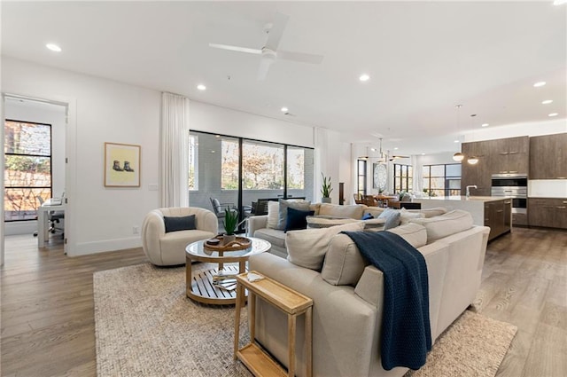 1494 Red Fox Dr NE Unit D, Atlanta, GA 30306 - living room featuring recessed lighting, plenty of natural light, light wood finished floors, and a ceiling fan