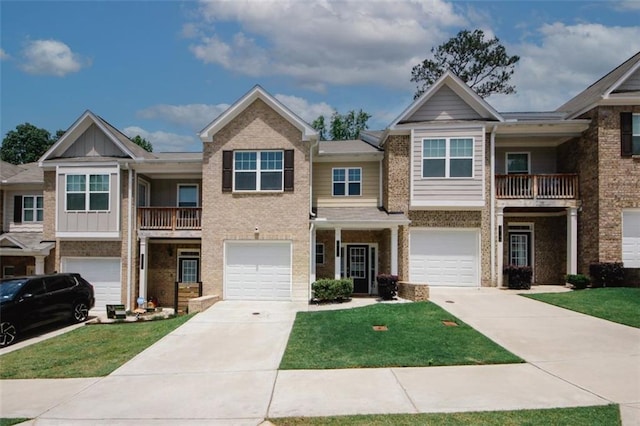 view of property with brick siding, driveway, and an attached garage