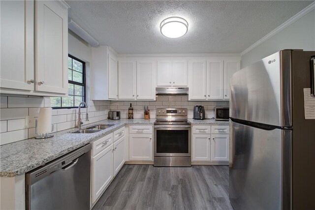 dining area with crown molding, dark hardwood / wood-style flooring, and a textured ceiling