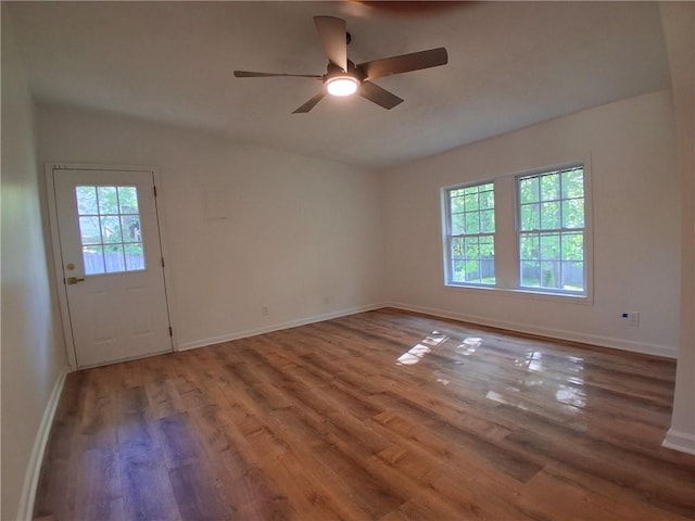 816 Stewart St, Carrollton, GA 30117 - unfurnished room featuring a ceiling fan, wood finished floors, and baseboards