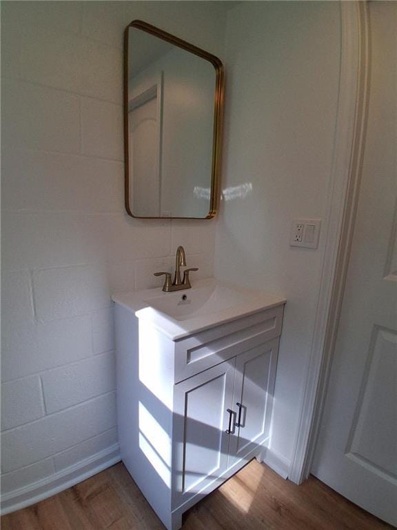 816 Stewart St, Carrollton, GA 30117 - bathroom featuring vanity and wood finished floors