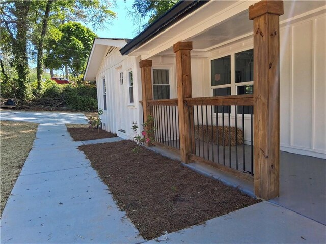 816 Stewart St, Carrollton, GA 30117 - view of side of home with board and batten siding