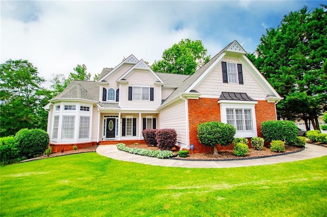 2003 Hubbard Ct, Villa Rica, GA 30180 - view of front of home featuring brick siding and a front yard