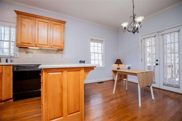 2003 Hubbard Ct, Villa Rica, GA 30180 - kitchen featuring dishwasher, wood finished floors, a peninsula, light countertops, and ornamental molding