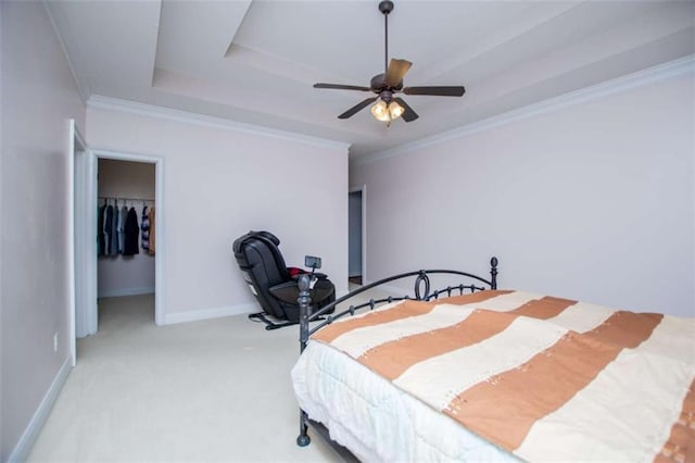 2003 Hubbard Ct, Villa Rica, GA 30180 - bedroom with carpet, baseboards, crown molding, a closet, and a walk in closet