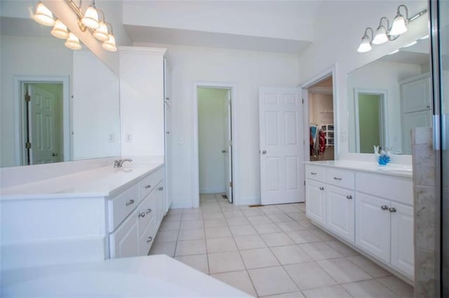 2003 Hubbard Ct, Villa Rica, GA 30180 - bathroom featuring tile patterned flooring, vanity, and a spacious closet