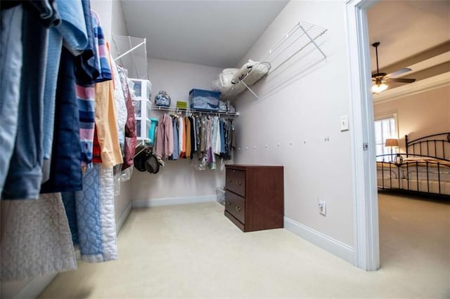 2003 Hubbard Ct, Villa Rica, GA 30180 - walk in closet featuring carpet flooring and ceiling fan