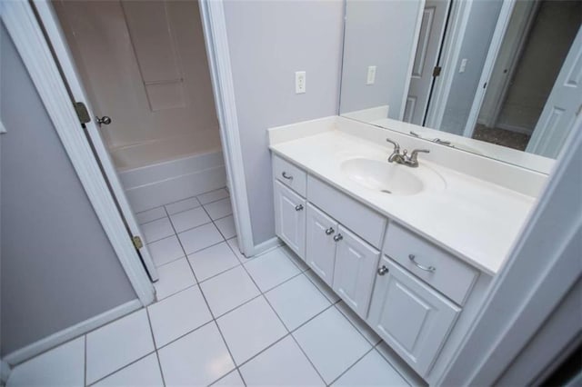 2003 Hubbard Ct, Villa Rica, GA 30180 - full bathroom with vanity, tile patterned flooring, baseboards, and bathing tub / shower combination