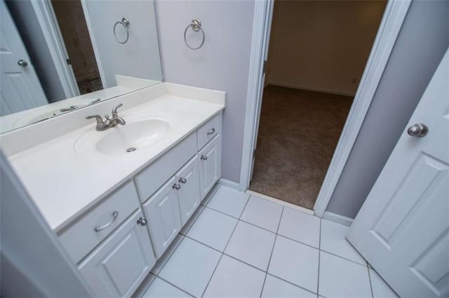 2003 Hubbard Ct, Villa Rica, GA 30180 - bathroom featuring vanity, baseboards, and tile patterned flooring