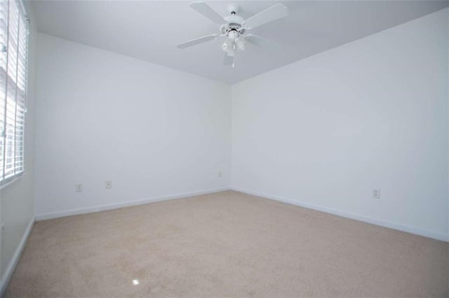 2003 Hubbard Ct, Villa Rica, GA 30180 - carpeted spare room with plenty of natural light, baseboards, and a ceiling fan