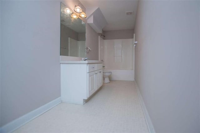 2003 Hubbard Ct, Villa Rica, GA 30180 - full bath with vanity, baseboards, toilet, and washtub / shower combination