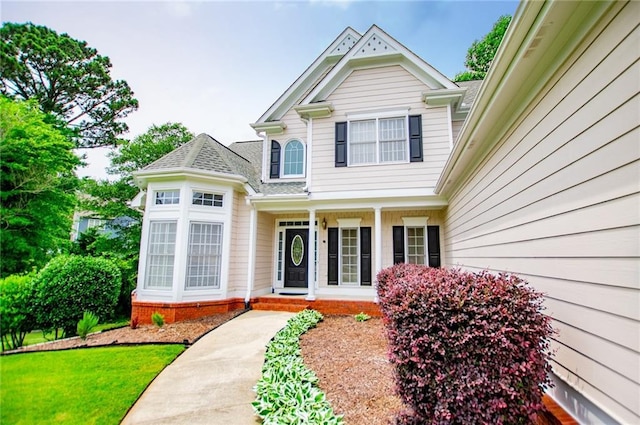 2003 Hubbard Ct, Villa Rica, GA 30180 - view of front of house featuring a porch and roof with shingles