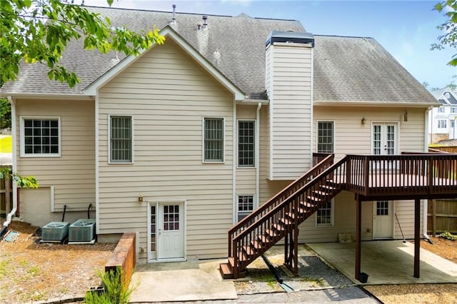 2003 Hubbard Ct, Villa Rica, GA 30180 - rear view of house featuring a patio area, stairs, a deck, a chimney, and central AC unit