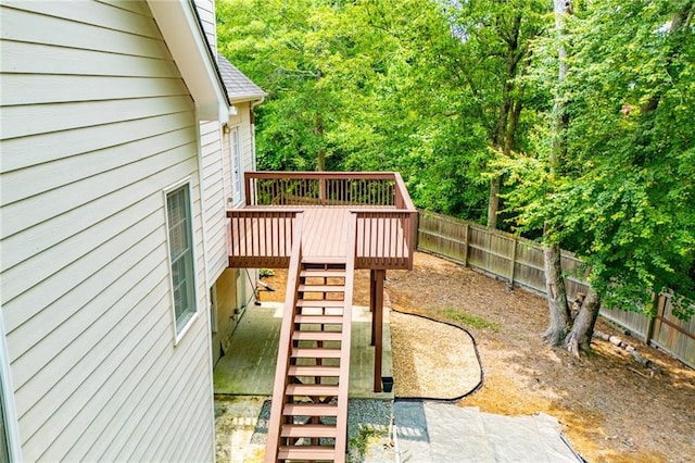2003 Hubbard Ct, Villa Rica, GA 30180 - fenced backyard with stairway and a wooden deck