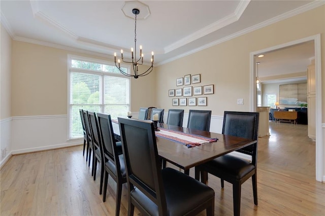 130 Hamilton Way, Roswell, GA 30075 - dining area with plenty of natural light, a chandelier, light wood finished floors, and ornamental molding