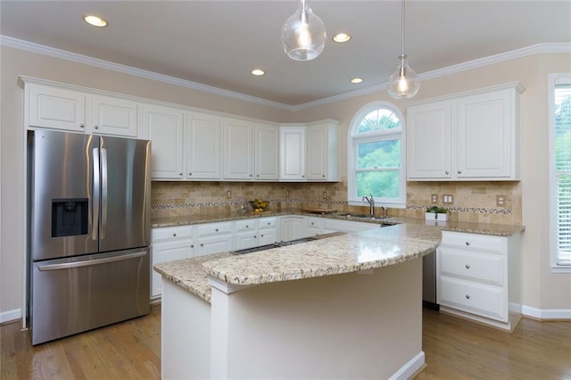 130 Hamilton Way, Roswell, GA 30075 - kitchen with stainless steel fridge, light wood finished floors, white cabinetry, healthy amount of natural light, and recessed lighting