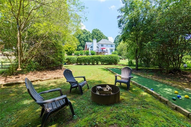 130 Hamilton Way, Roswell, GA 30075 - view of green lawn featuring a game area and a fire pit