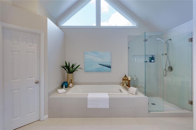 130 Hamilton Way, Roswell, GA 30075 - full bathroom with a garden tub, a stall shower, vaulted ceiling, and plenty of natural light