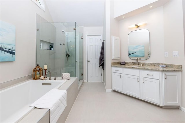 130 Hamilton Way, Roswell, GA 30075 - bathroom with a shower stall, vanity, a garden tub, and recessed lighting