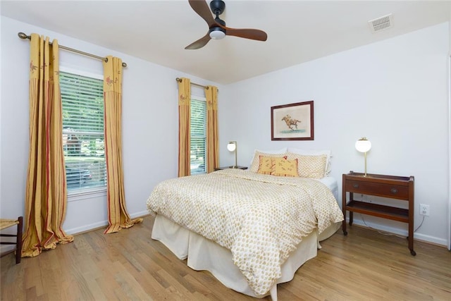 130 Hamilton Way, Roswell, GA 30075 - bedroom featuring light wood-style flooring and a ceiling fan