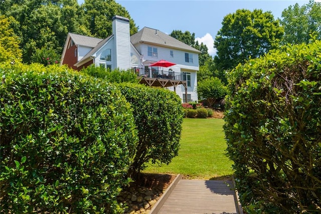 130 Hamilton Way, Roswell, GA 30075 - rear view of house featuring a lawn and a chimney