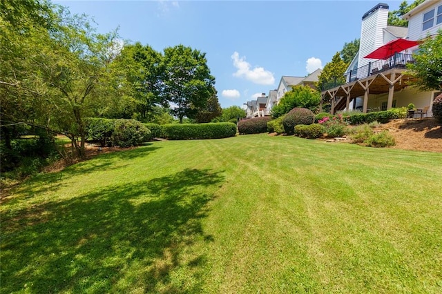130 Hamilton Way, Roswell, GA 30075 - view of grassy yard with a wooden deck and stairway