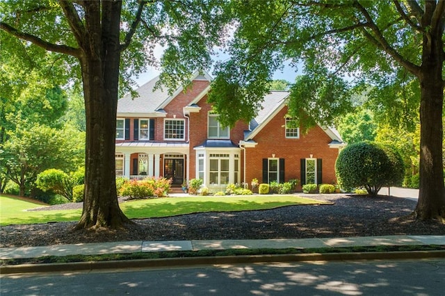 130 Hamilton Way, Roswell, GA 30075 - view of front of property with brick siding and a front lawn
