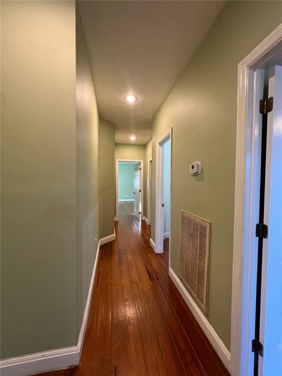 hall featuring dark hardwood / wood-style flooring