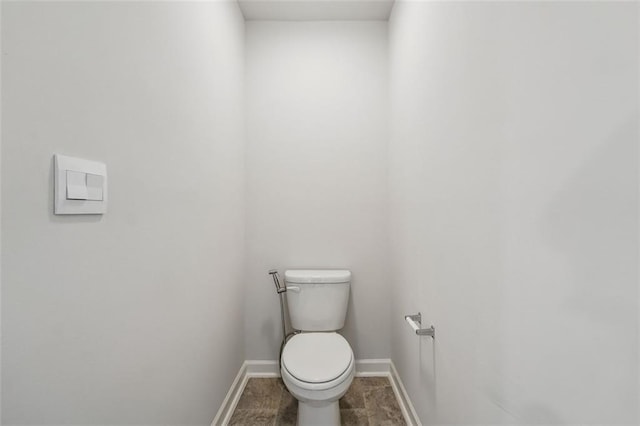 96 Quail Bend Way, Dallas, GA 30157 - bathroom featuring toilet and baseboards